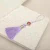 6CM trébol de cuatro hojas borla fuzi borla marcapáginas oreja colgante colgante de joyería caja de regalo accesorios colgantes grandes precio excelente