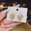 Pendientes Elegantes de Alta Calidad Diseño de Nicho Pendientes Dorados Pequeños y Exquisitos Pendientes de Ojo de Mariposa con Piedra Aguja de Plata para Mujer