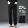 Jeans de alta gama para hombre de Guangzhou Xintang, nueva colección otoño/invierno 2026, pierna recta, corte holgado, pierna ancha, pantalones largos elásticos