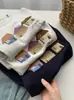 Camiseta Estampada Bordada Little House Indústria Pesada Gola Redonda Manga Curta Feminina 2026 Verão Novo Estilo Coreano Solta Reduzir Idade Top