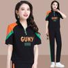 Conjunto Esportivo Casual para Mulheres Verão Transfronteiriço Novo Tamanho Grande Fashionável Cor Contrastante Redutor de Idade Manga Curta Calças Conjunto de Duas Peças
