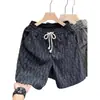 Nuevos Shorts Casuales de Cuadros con Cordón para Hombre Moda Tendencia Versátiles Sueltos Simples Pantalones de Cinco Puntos Tendencia