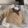 Suéter de Punto para Niña Otoño Invierno 2026 Nuevo Cardigan de Punto con Lunares y Lazo Estilo Coreano para Niña Top Elegante Transfronterizo