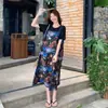 Conjunto de Dos Piezas de Moda Casual Adelgazante Simple de Manga Corta + Falda con Tirantes Estampado de Pintura al Óleo Verano 2026