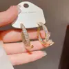 Pendientes de Cruz Reversibles con Tachuelas de Diamante Inspirados en el Diseño, Estilo Coreano, Geniales y Únicos, Pendientes Súper Brillantes al por Mayor