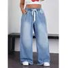 Jeans de pierna ancha con cintura elástica y cordón, dobladillo sin rematar, lavado desgastado, adelgazantes y que realzan la altura