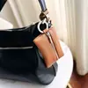 Bolsa para llaves de cuero PU fresca estilo japonés con patrón de lichi, Portallaves portátil anti-pérdida, Billetera portátil para mujer