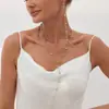 Joyería Transfronteriza Europea y Americana Cadena Larga con Colgante de Borla en Forma de Y y Perla Redonda Collar Femenino de Temperamento Asimétrico de Negocios Hebilla OTs