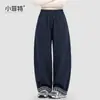 Colección de otoño 2026 para niñas Xiaofei, nuevo estilo, pantalones casuales de pierna curva para niños mayores, pantalones de cuadros modernos de pierna recta con dobladillo acampanado