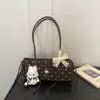 Bolso de Hombro para Mujer con Lazo de Nicho 2026 Nuevo Moda Otoño Invierno Versátil Bolso de Hombro de Lunares Bolso para el Trabajo y el Trayecto