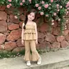 Conjunto de Tirantes de Verano 2026 Nuevo Vestido de Tirantes Fino de Seda de Hielo para Niñas Pantalones Acampanados de Nueve Puntos Conjunto de Dos Piezas Elegante de Moda