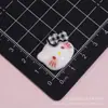Accesorios de resina de gato KT con lazo de cuadros vintage, accesorios para el cabello DIY con pegamento cremoso, ligas para el cabello, pinzas para el cabello, zuecos, fundas para teléfono