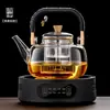 Tetera de vidrio de borosilicato alto con función integrada de vaporización y ebullición, resistente a altas temperaturas, modelo nuevo para uso doméstico, apta para estufas eléctricas de cerámica, disponible para venta al por mayor