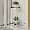 Nuevo estilo de soporte para flores para sala de estar, estante simple de hierro de varios niveles para macetas de piso, estante de almacenamiento interior para balcón moderno al por mayor