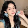 Pendientes de Borla con Lazo de Flor de Corazón de Aguja de Plata Temperamento Dulce Versátil Clavo Moda Nicho Pendientes de Gama Alta