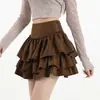 Falda escalonada marrón de cintura alta adelgazante para mujer, otoño 2026, falda corta abullonada adelgazante de cintura alta para chica popular A13487