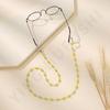 Fabricante transfronterizo de gafas con pequeñas cuentas de arroz, populares en Europa y América, con cadena colgante antideslizante y cordón para gafas de cristal de color sólido.