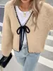 Cárdigan de punto de estilo nuevo para otoño e invierno, europeo y americano, transfronterizo, con corbata, top de manga larga suelto de color liso, chaqueta de moda para mujer