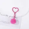 Llavero de corazón con pompón de colores, hebilla creativa de corazón hueco de dopamina, accesorio para bolso, adorno de regalo, colgante de cuentas