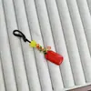 Colgante de Cadena para Teléfono Móvil Colgante para Llavero de Coche Colgante Sencillo para Hombres y Mujeres Cinnabar Púrpura Arena Dorada Venta al por Mayor