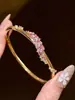 Pulsera tejida hueca de plata, estilo transfronterizo europeo y americano, fresca y elegante, moderna, exquisita, única, versátil, pulsera de alta gama