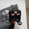 Mochila de color sólido estilo coreano para mujer, estilo universitario, para ir al trabajo, transfronteriza, nueva mochila de mano con lazo de moda 2026