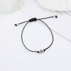 Pulsera de cuero de cuerda negra transfronteriza con colgante de tótem mítico retro cuerda de mano para amantes cuerda de cera tejida a mano simple pulsera tejida a mano venta al por mayor