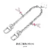 En stock nuevo H-239 adecuado para cadena de modificación de bolso Coach Torre Eiffel helado diy bolsa decorativa accesorio versátil