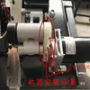 Máquina Flejadora Eléctrica Doble Semiautomática Transmisión Dividida Arriba y Abajo Engranaje Pequeño de Goma Plástico de Nylon Hierro Engrosado