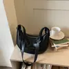 Bolsa de mão feminina de alta qualidade transfronteiriça, nova bolsa de ombro da moda da primavera de 2026, bolsa versátil estilo bolinho