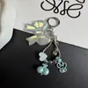 Nuevo colgante de lazo dulce corazón de cereza cadena de teléfono de hueso de serpiente llavero lindo accesorio para bolso