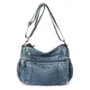 Bolsa feminina de couro lavado 2026 urbana minimalista grande capacidade bolsa de ombro feminina PU superfície macia moda bolsa de mãe atacado