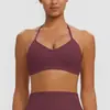 Sujetador deportivo de yoga estilo europeo y americano con diseño de cuello halter, que ofrece soporte para la espalda, absorción de impactos y propiedades de secado rápido, adecuado para correr, fitness y yoga