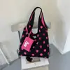 Bolsa tote de gran capacidad para mujer, nueva moda casual de verano 2026, bolso de hombro de lunares, ligero para la escuela y el trabajo