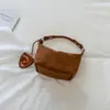 Bolso de hombro único de diseño de nicho francés transfronterizo para mujer, textura tejida, bolso de axila, bolso de mano moderno y fresco para el trabajo, mujer