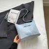 Bolso de hombro coreano Xiaozhong para mujer, bolso de hombro informal de moda, bolso de cubo portátil combinable de verano 2024