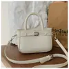 Bolsa pequena super popular para comércio exterior transfronteiriço para mulheres, nova bolsa quadrada pequena estilosa e moderna com um toque de luxo, bolsa de ombro única transversal