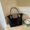 Bolsa de Gran Capacidad para Mujer 2026 Nueva Tendencia Ligera de Tela Bolso de Hombro Único Bolso Tote de Moda Casual para el Trabajo