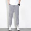 Pantalones deportivos para hombre, finos, de color liso, combinables, holgados, sencillos, modernos, de calle, informales, de cintura media, para jóvenes.