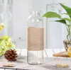 Mesa de comedor Nadi gotas de lluvia jarrón pequeño planta hidropónica Jarrón de cristal decoración bambú rico cuerda de cáñamo creativa arreglo floral