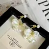 Pendientes Super Hada Pétalo de Perla para Mujer, Lujo Ligero, Gama Alta, Exquisitos, Versátiles, Pendientes Impresionantes