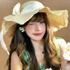 Sombrero de Paja para Mujer 2026 Nuevo Verano Estilo Francés Encaje Lazo Ala Ancha Tejido Sombrero Vacaciones en la Playa Sombrero de Protección Solar