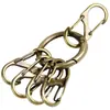 Llavero de Diseño de Nicho Anillo Colgante de Cintura Hebilla en S Elegante Simple Retro Hebilla en Forma de 8 Bronce Llavero de Metal Antirrobo