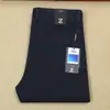 Pantalones Casuales para Hombre Serie Z Nuevos de Otoño e Invierno Cálidos Gruesos de Pierna Recta Ajustados Elásticos Bolsillo Oculto con Botón Forro Polar