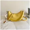 Venta al por mayor transfronteriza de bolsos de axila para mujer de estilo vintage nuevo, bolsos tipo dumpling modernos y elegantes para salir, bolsos de mano, de hombro y cruzados