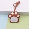 Nuevo lindo cordón de pata de gato de cuero PU de dibujos animados, accesorio colgante para llavero de mochila creativa, vehículo eléctrico, venta al por mayor
