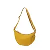 Bolso de un solo hombro para mujer ligero versátil deportivo casual bolsa tipo dumpling estilo artístico gran capacidad color sólido bolso de mano simple