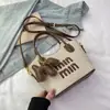 Bolsas de Mujer Transfronterizas 2026 Nueva Moda Tendencia Bolso Cubo de Paja con Letras Versátil Bolso de Hombro y Cruzado para la Playa