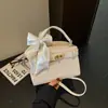 Bolsa Cruzada de Hombro Tendencia Chic Estilo Coreano Primavera 2026 Bolso de Mano Texturizado de Moda Simple para Viajes Diarios para Mujer