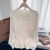 Suéter de moda otoño e invierno 2026 para mujer, nuevo top de punto versátil de corte holgado con cuello redondo y manga larga, con un diseño único